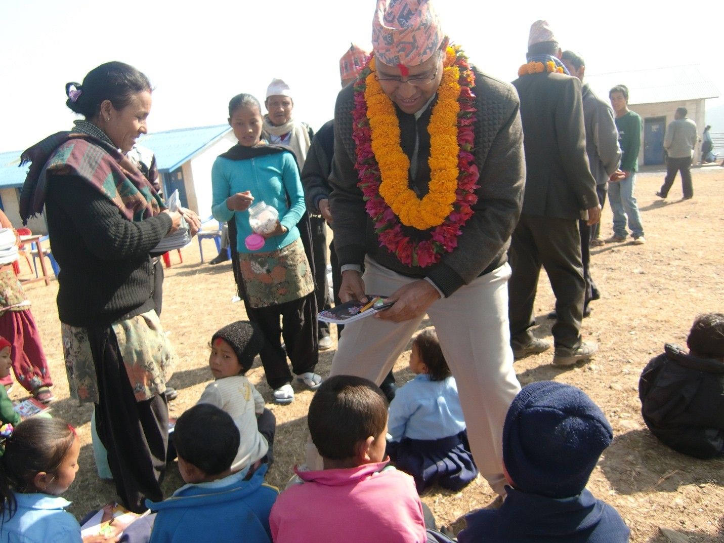 Company donation event showing volunteers serving seniors