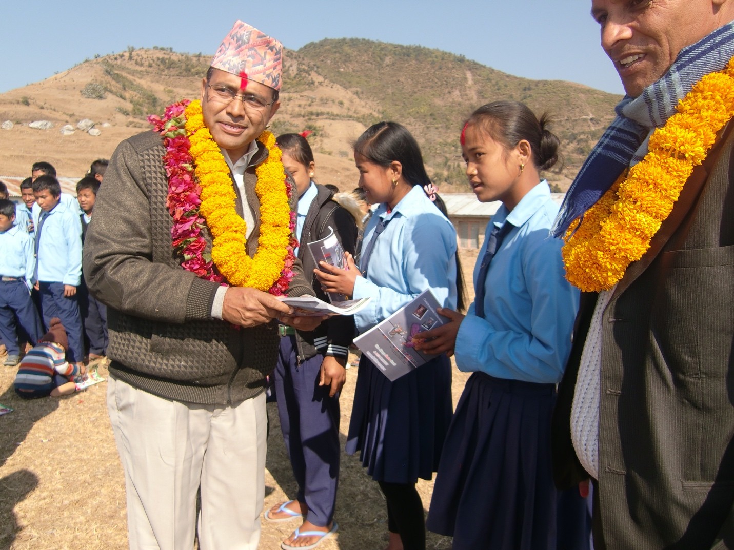 Company donation event showing volunteers serving seniors