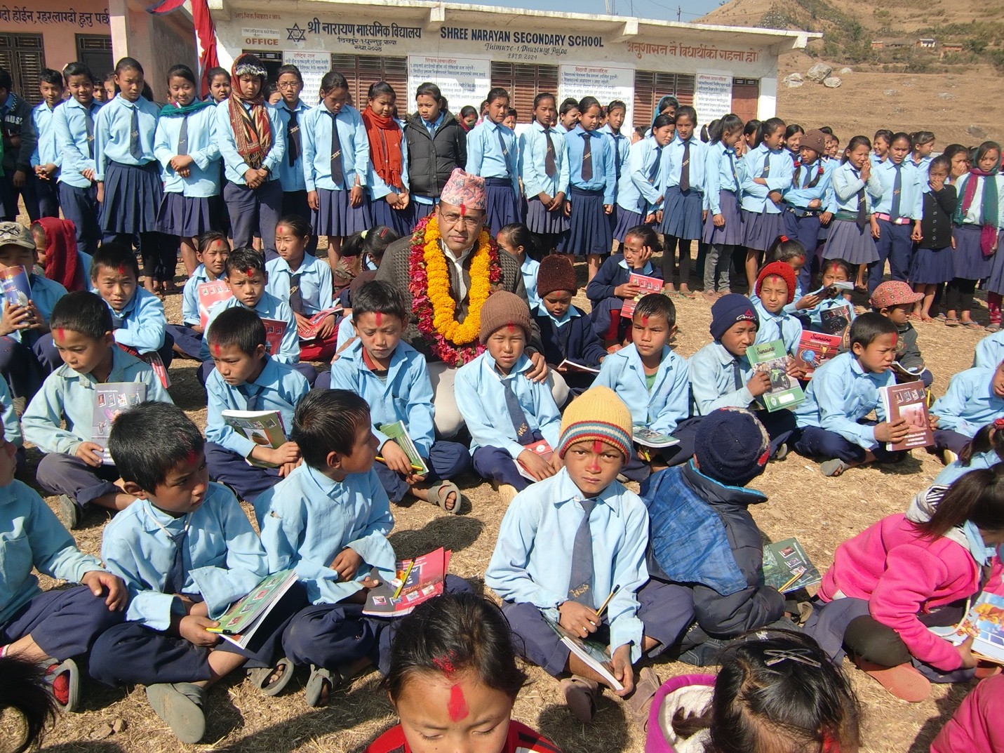 Company donation event showing volunteers serving seniors